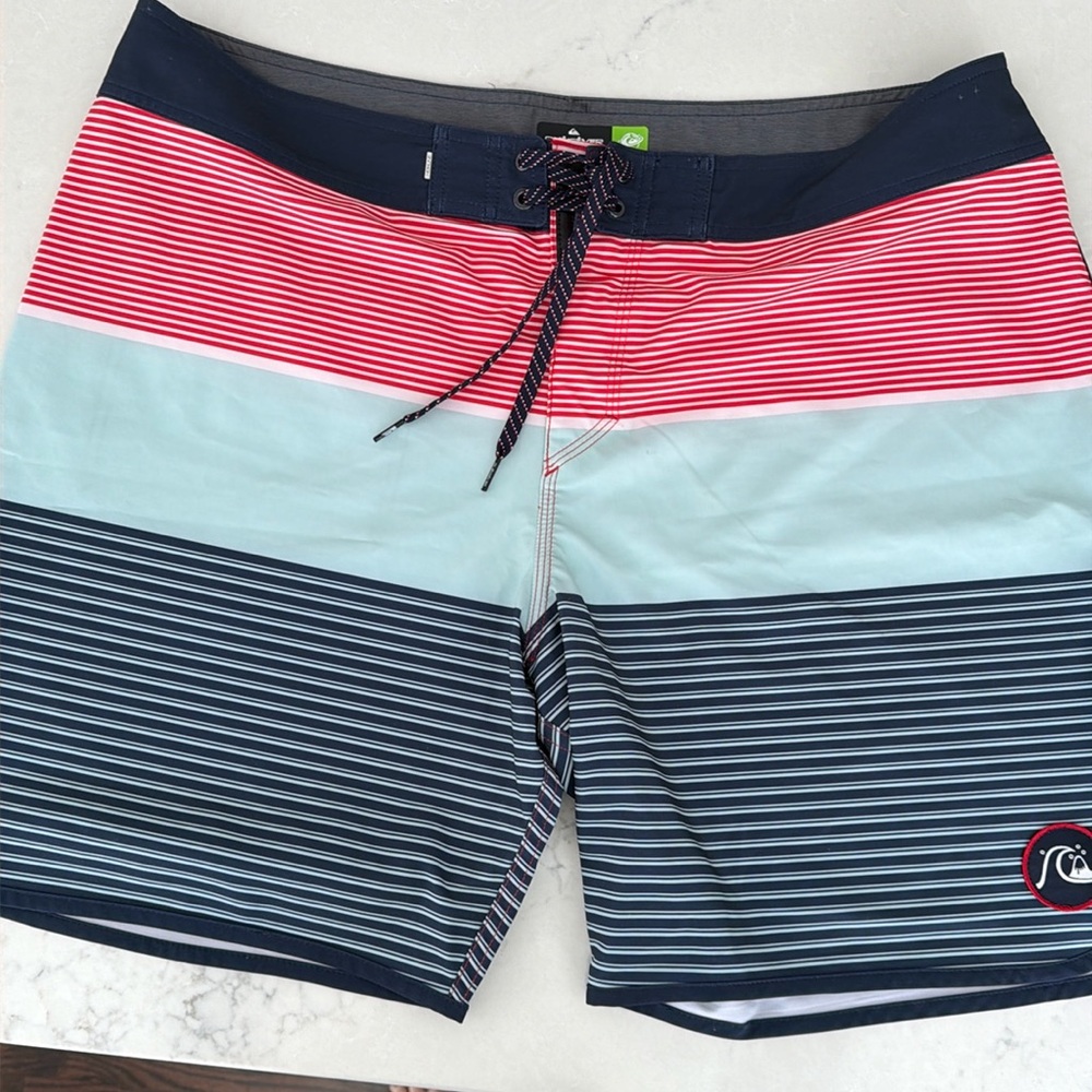 Quiksilver Men’s board shorts, size 38, small mark as  shown in picture
